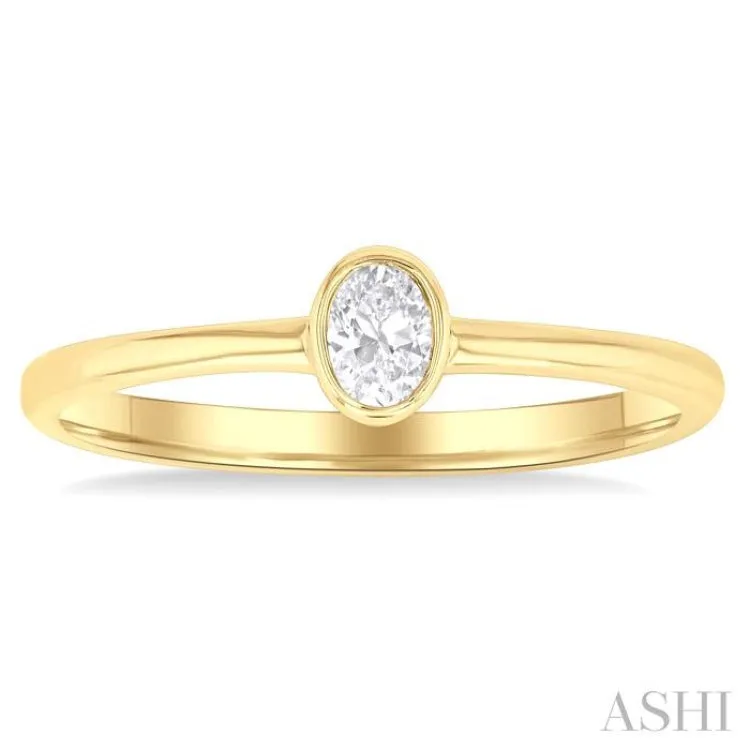 1/6 Ctw Petite Bezel Set Oval Cut Diamond Fashion Ring in 10K Yellow Gold