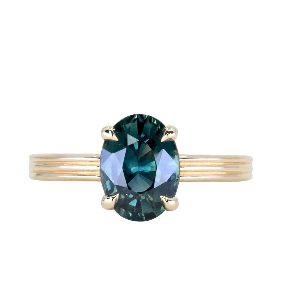 2.58ct Untreated Teal Oval Madagascar Sapphire Low Profile Tri-Band "Three Winds" 4 Prong Solitaire in 14k Yellow Gold