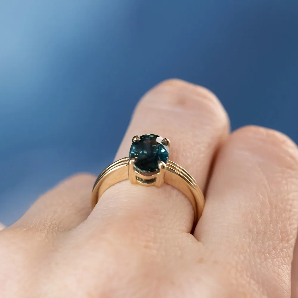 2.58ct Untreated Teal Oval Madagascar Sapphire Low Profile Tri-Band "Three Winds" 4 Prong Solitaire in 14k Yellow Gold