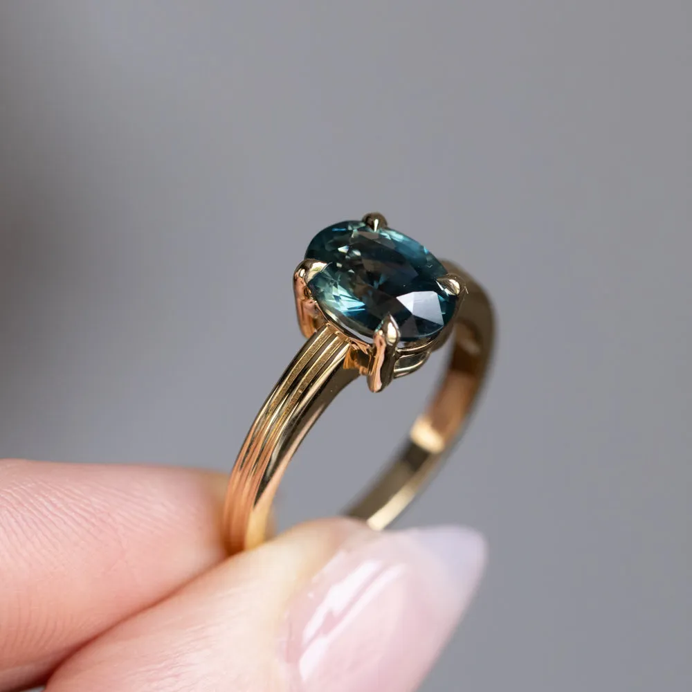 2.58ct Untreated Teal Oval Madagascar Sapphire Low Profile Tri-Band "Three Winds" 4 Prong Solitaire in 14k Yellow Gold