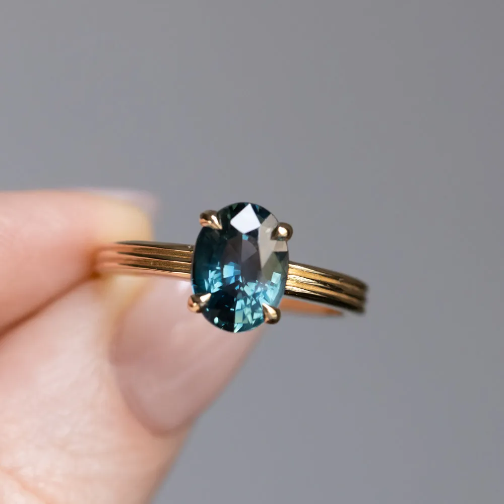 2.58ct Untreated Teal Oval Madagascar Sapphire Low Profile Tri-Band "Three Winds" 4 Prong Solitaire in 14k Yellow Gold