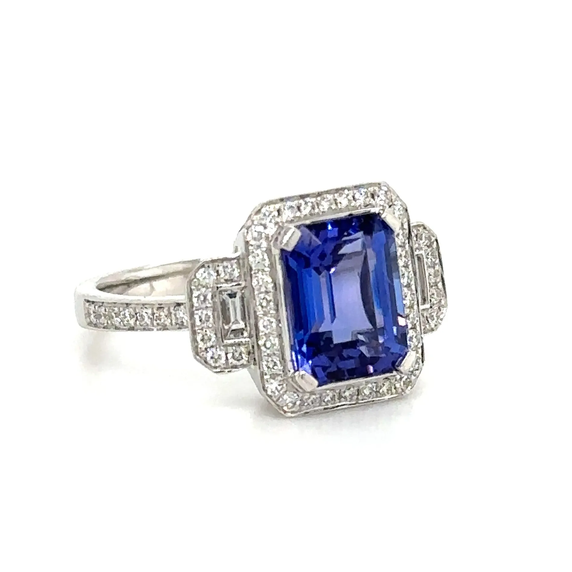 3.26carat Tanzanite Emerald Cut Center Three Stone Diamond Ring