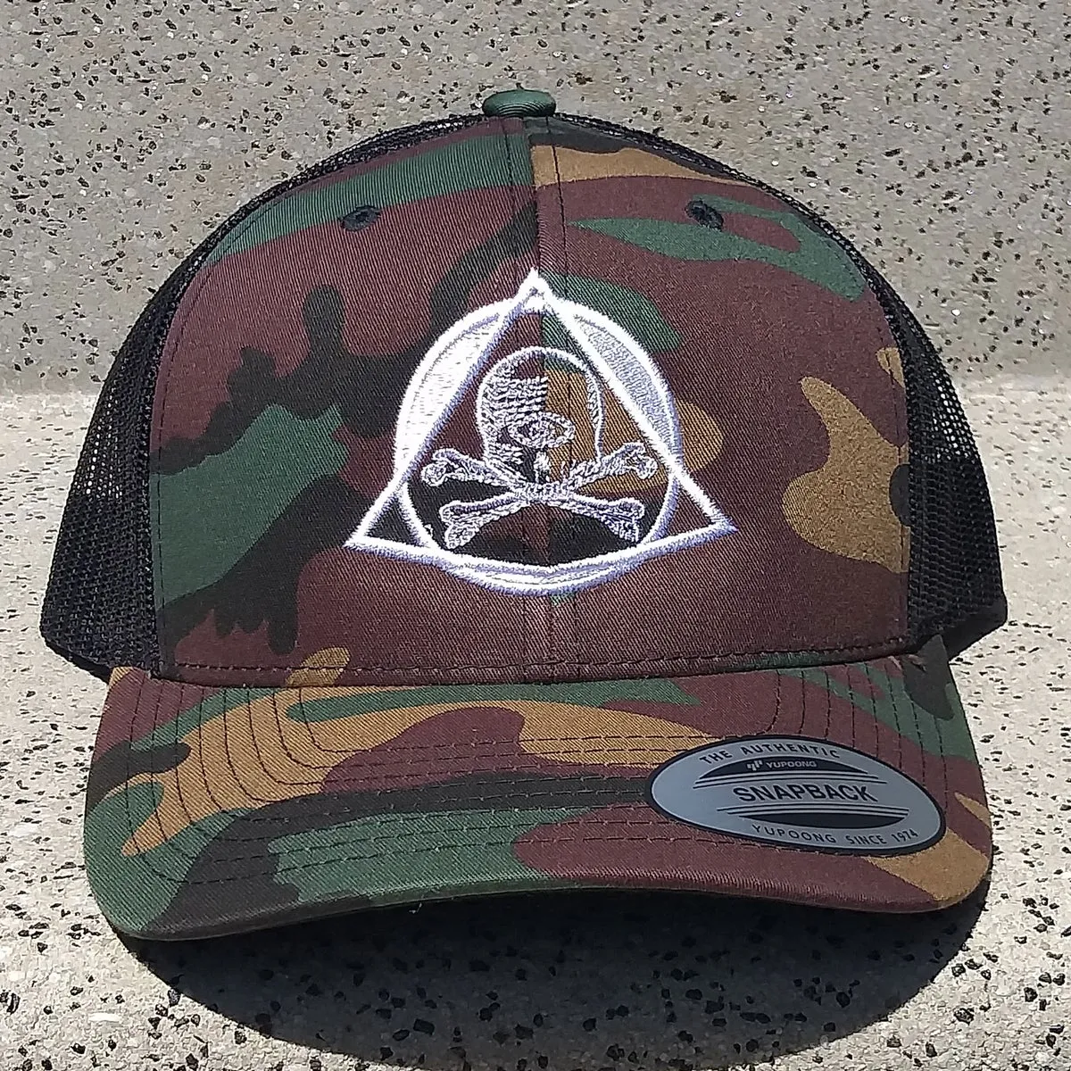 OFFICIAL SAINT VITUS BAR CAMO TRUCKER SNAPBACK CAP W/ HIGH DENSITY EMBROIDERY